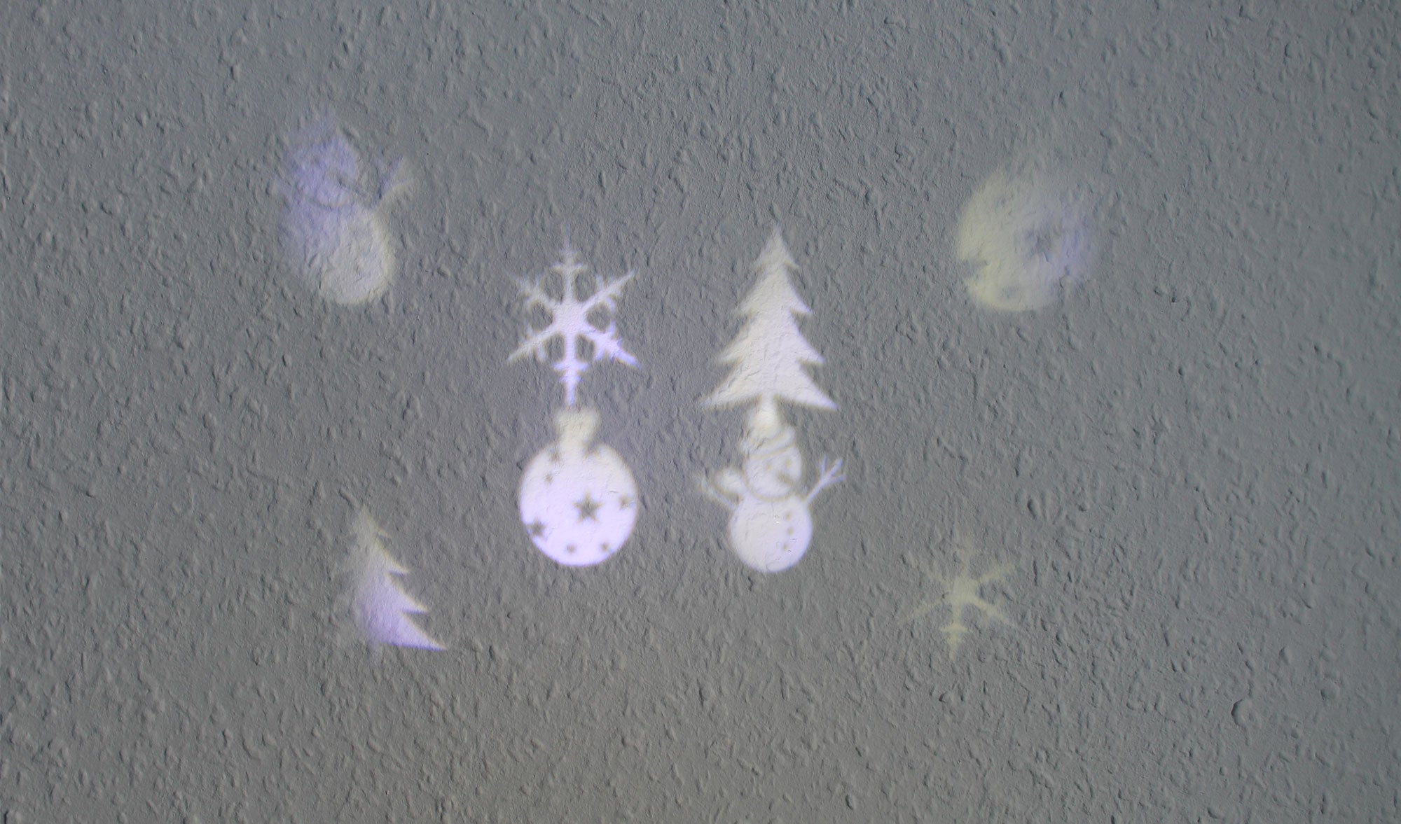 LED Projektor mit 6 Motiv-Schablonen Weißes Licht Gartenprojektor Weihnachtsdeko Effektlicht